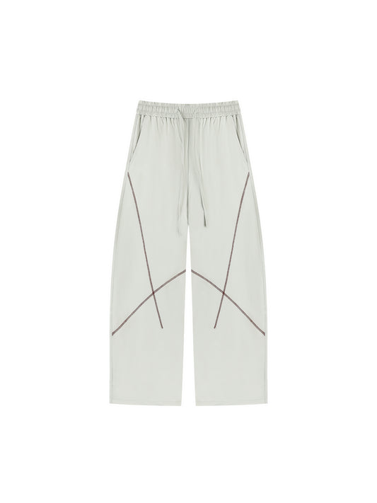 Grey Pants with Contrast stitching enhances the silhouette, adding subtle detail without compromising a clean look. Finished with practical pockets and a versatile design, these pants are ideal for casual outfits, travel, and athleisure wear.