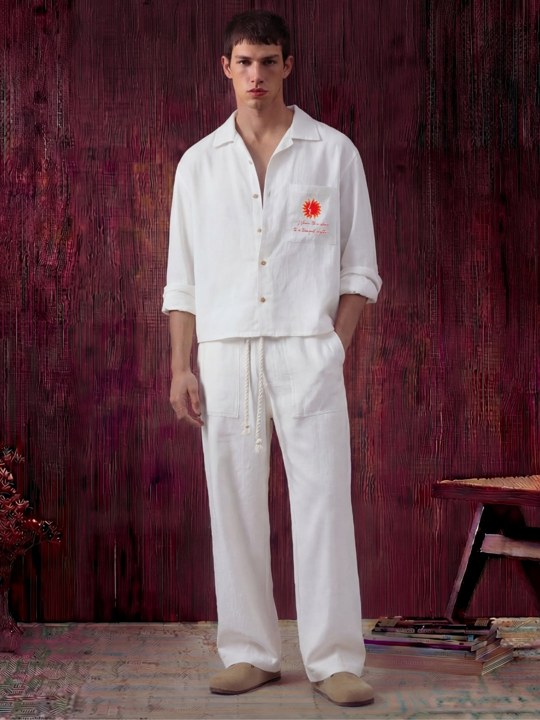 White linen shirt and pant outfit set, crafted from 100% breathable linen for effortless comfort. Pant with pockets and adjustable drawstring.