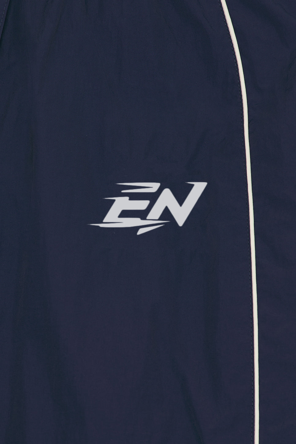 Navy blue pant with a white logo on a dark background