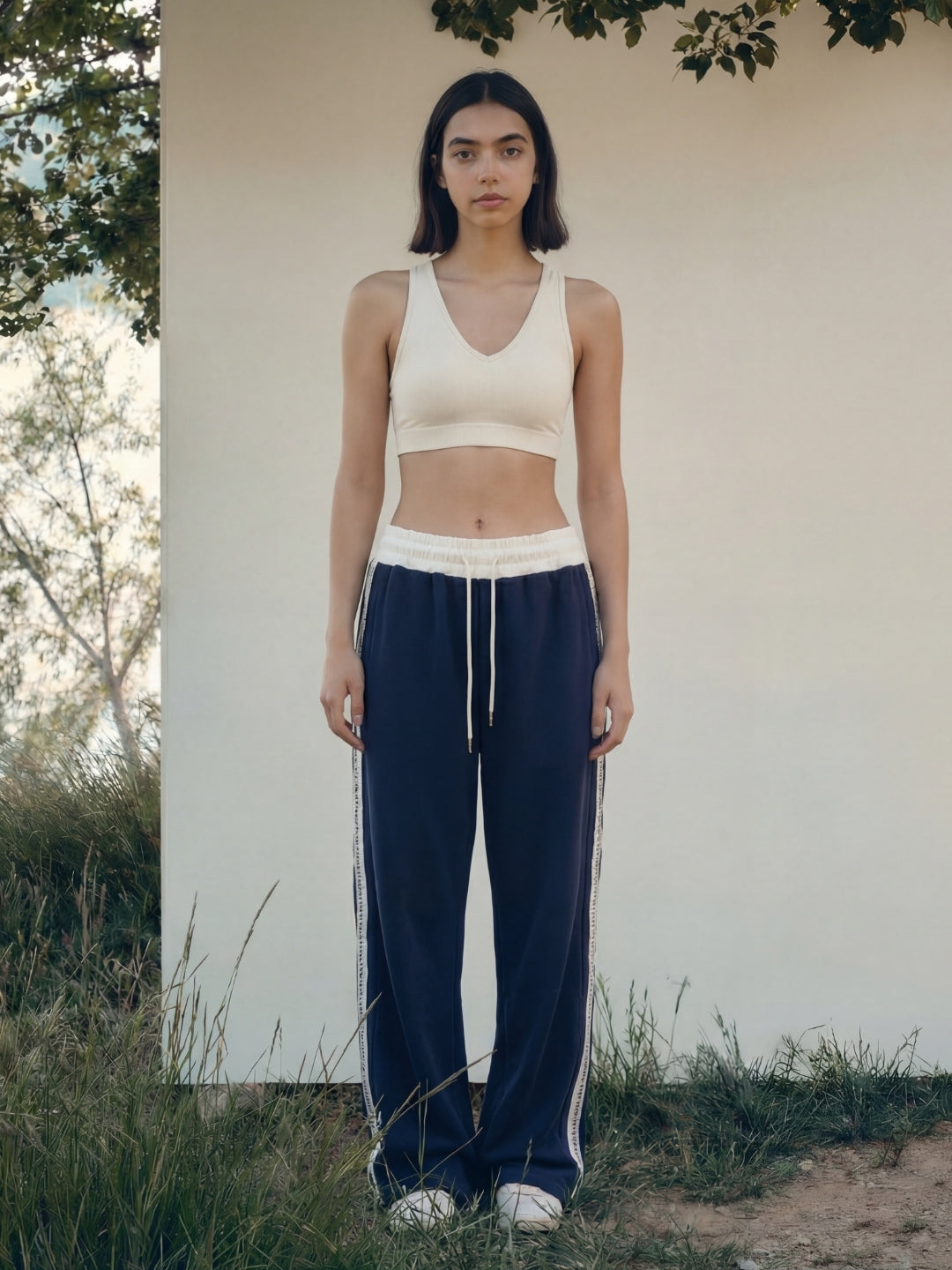 Navy Sweat Pants with adjustable drawstrings and white strips 