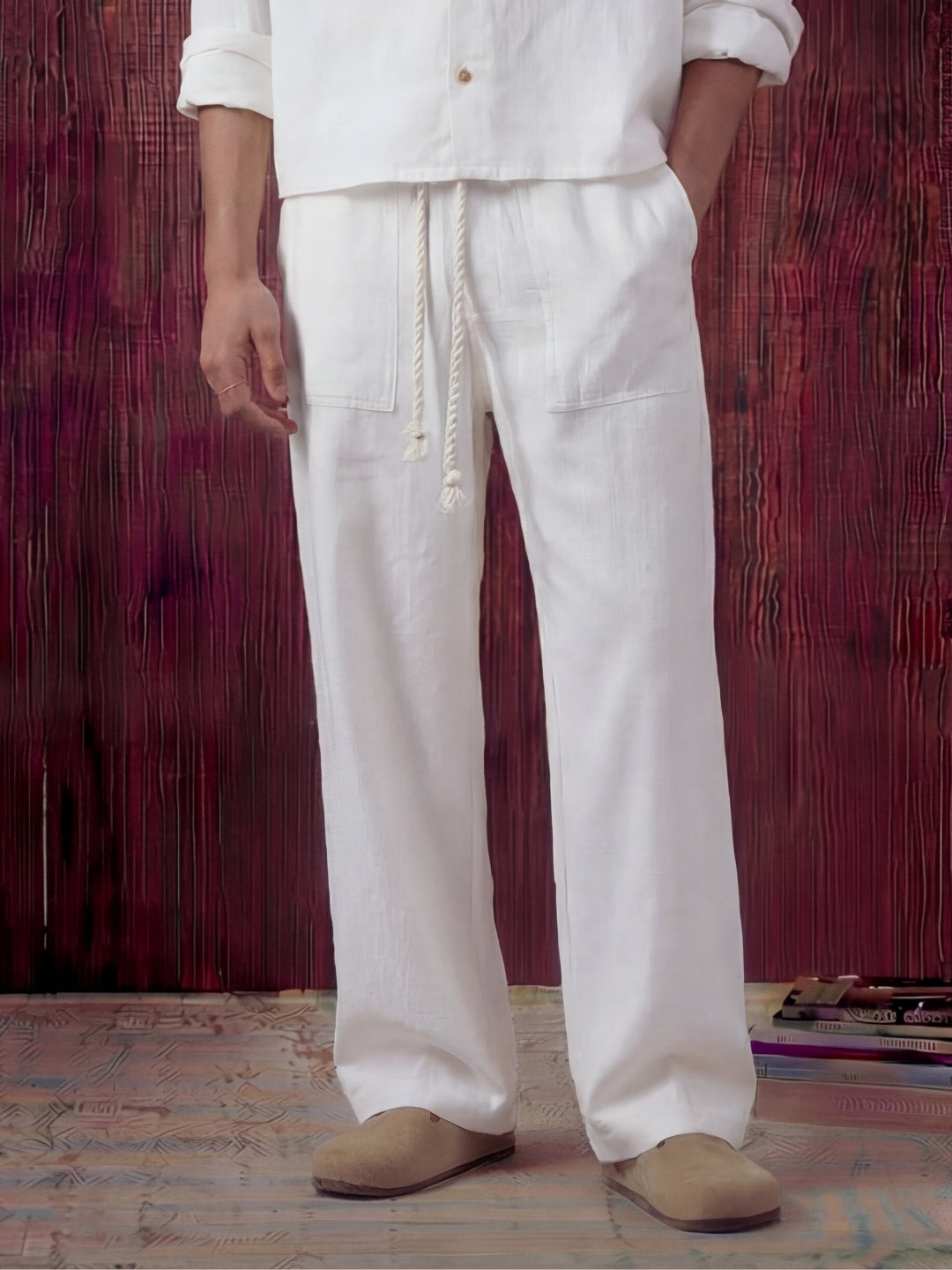 White linen shirt and pant outfit set, crafted from 100% breathable linen for effortless comfort. Pant with pockets and adjustable drawstring.