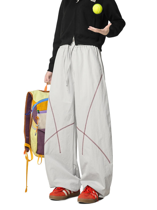 Grey Pants with Contrast stitching enhances the silhouette, adding subtle detail without compromising a clean look. Finished with practical pockets and a versatile design, these pants are ideal for casual outfits, travel, and athleisure wear.