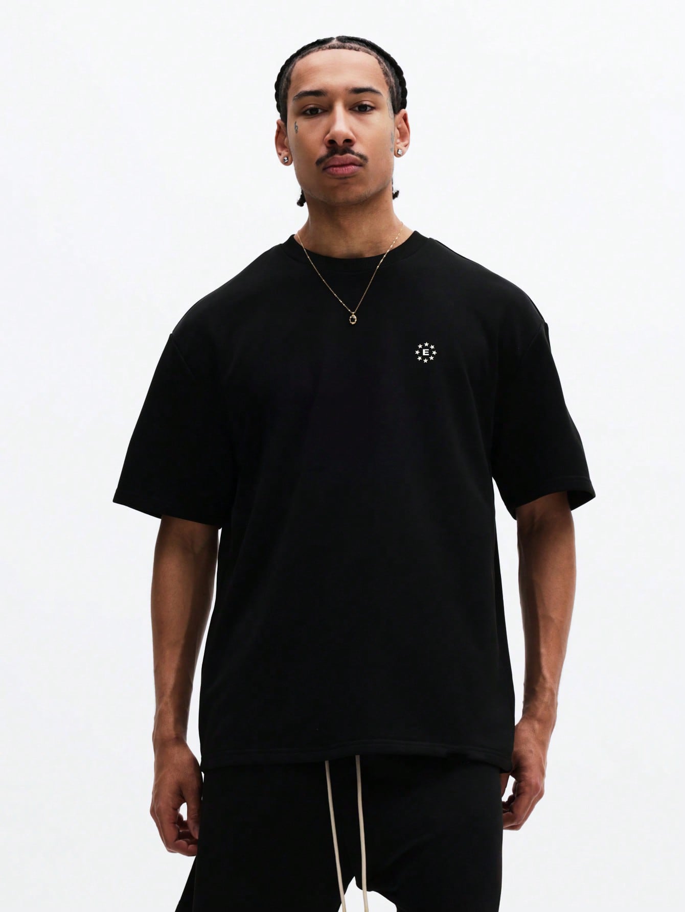 The Nitro T-Shirt and Shorts Set is designed in black for effortless style, comfort, and everyday versatility. Crafted from soft, breathable fabric, it features a relaxed-fit oversized tee paired with coordinating shorts.