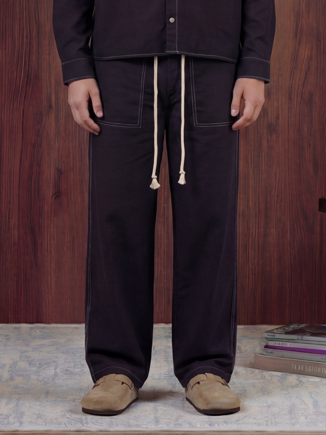 Black linen shirt and pant outfit set, crafted from 100% breathable linen for effortless comfort. Pant with pockets and adjustable drawstring.