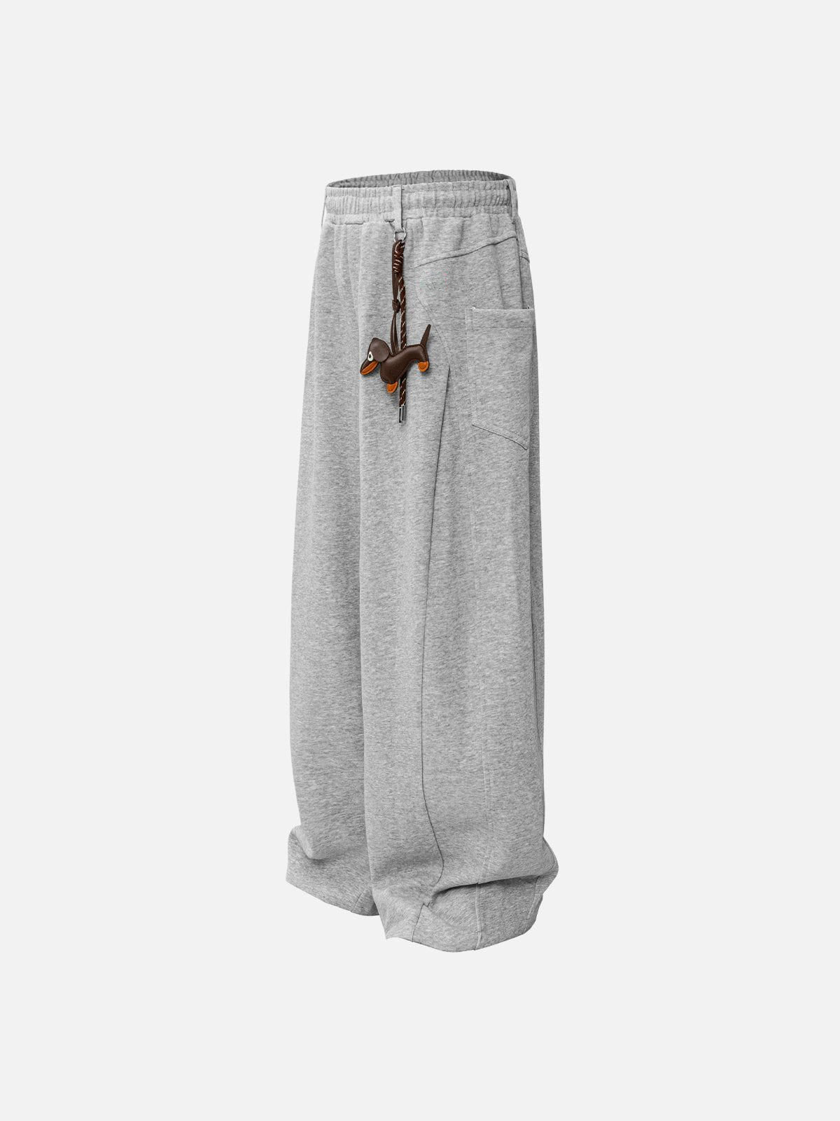 Grey sweatpants with decorative elements on a white background
