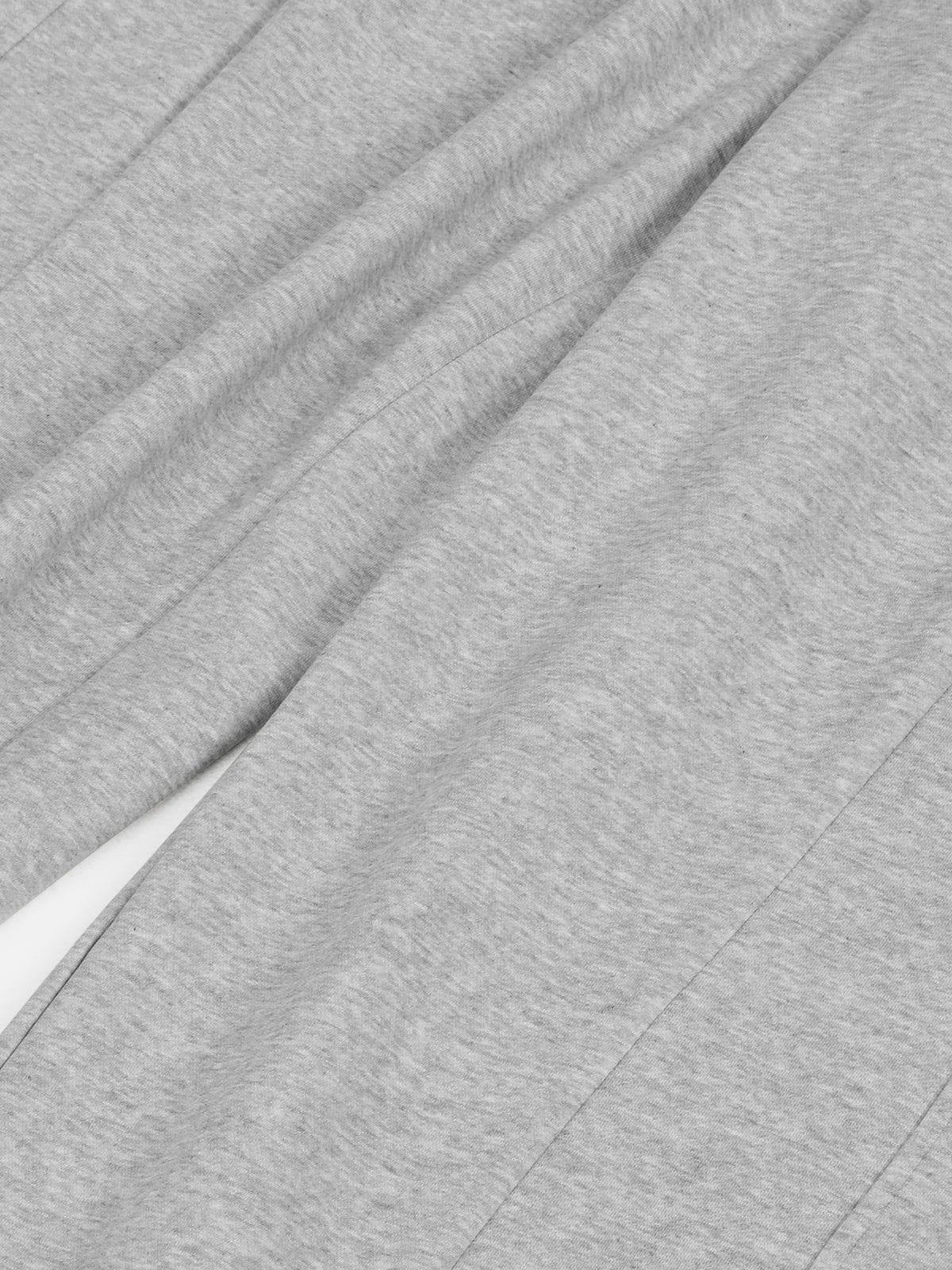 Close-up of grey fabric with folds