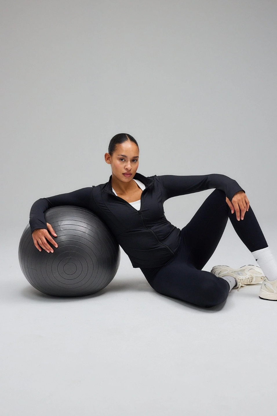 Black Hyper Zip Jacket with full sleeves, featuring a front zipper and a round neckline.