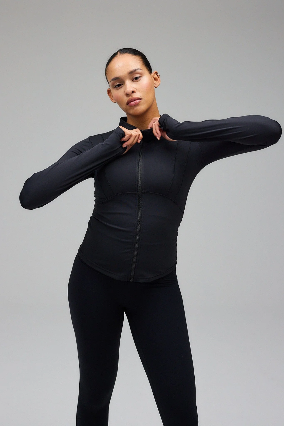 Black Hyper Zip Jacket with full sleeves, featuring a front zipper and a round neckline.