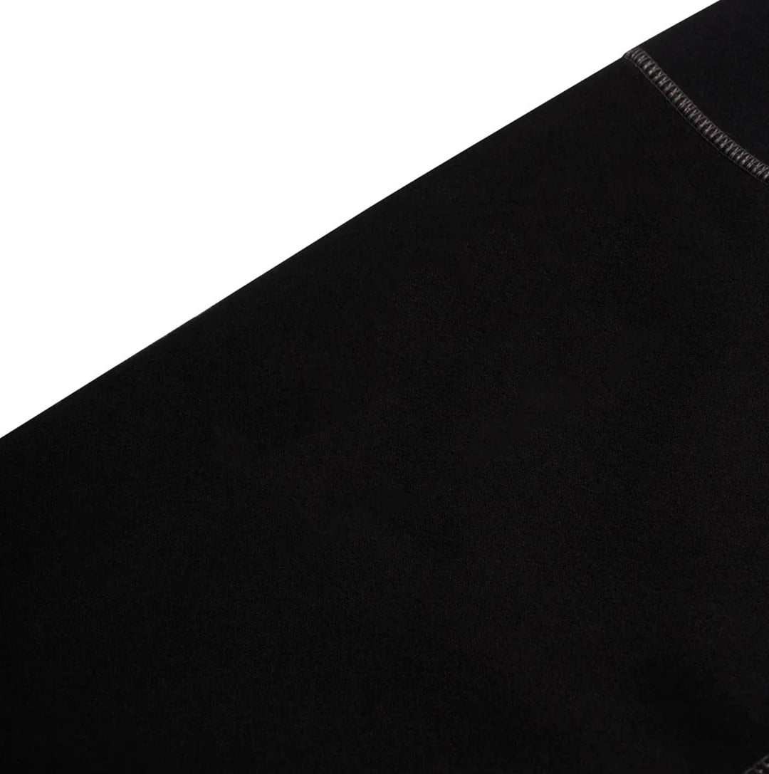 Close-up of black fabric with a slight texture on a white background