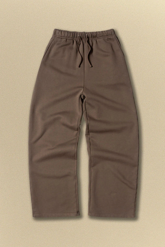 Brown pants on a beige background