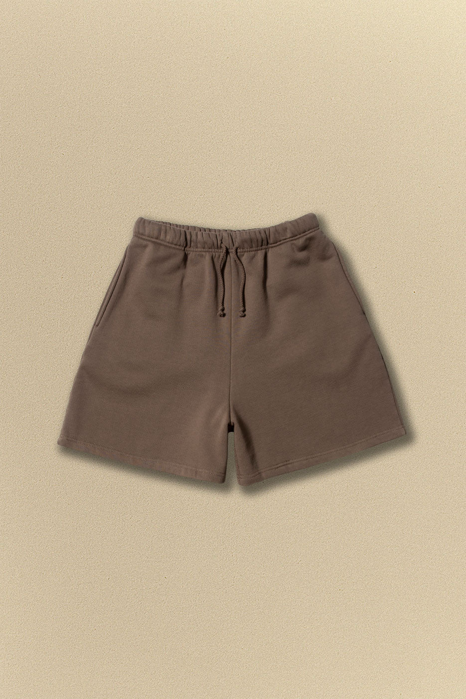 Brown shorts on a beige background