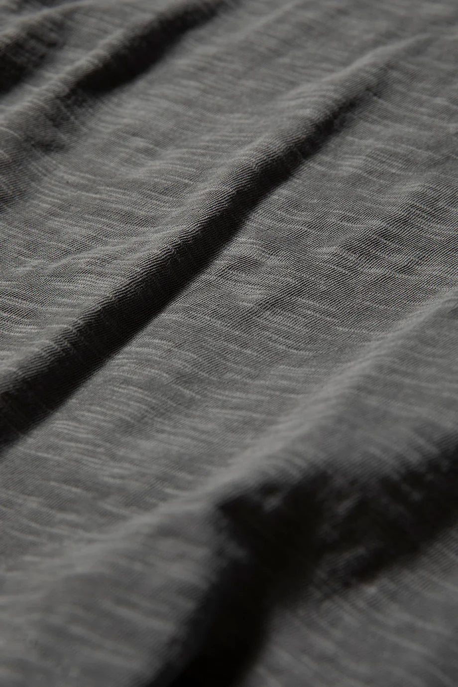 Close-up of grey fabric with visible texture