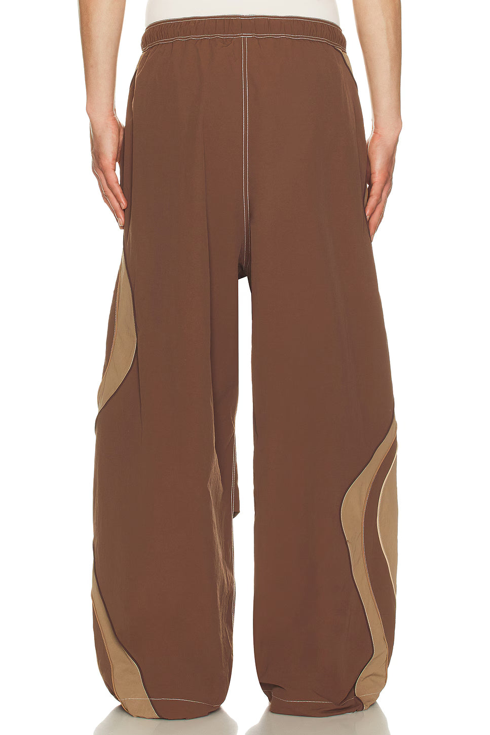 Brown pants with beige accents on a white background