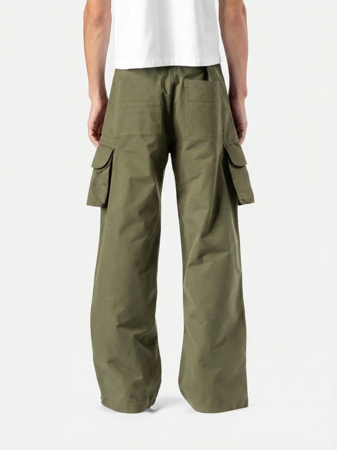 Green Celestial Cargo bold streetwear energy with everyday comfort. With oversized utility pockets, a relaxed silhouette and elevated detailing, these pants are built for movement and presence.