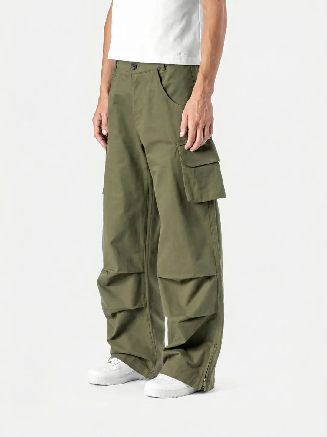 Green Celestial Cargo bold streetwear energy with everyday comfort. With oversized utility pockets, a relaxed silhouette and elevated detailing, these pants are built for movement and presence.