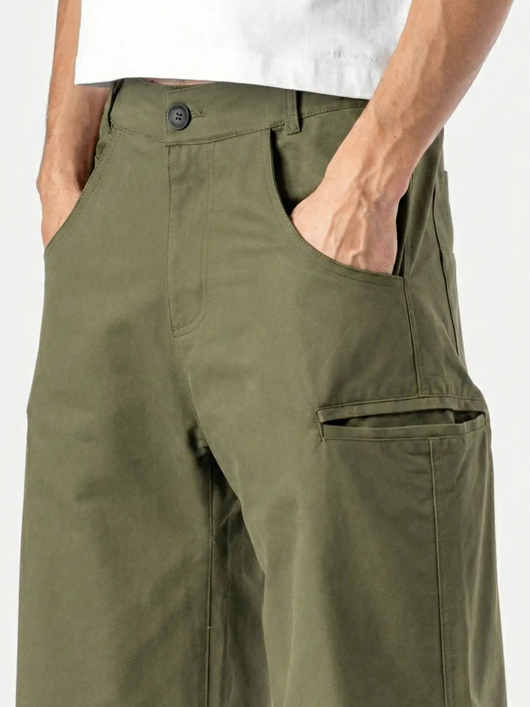 Green Celestial Cargo bold streetwear energy with everyday comfort. With oversized utility pockets, a relaxed silhouette and elevated detailing, these pants are built for movement and presence.