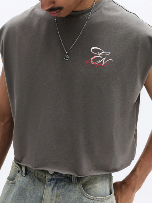 Man wearing a sleeveless grey shirt with Everdion logo on a white background