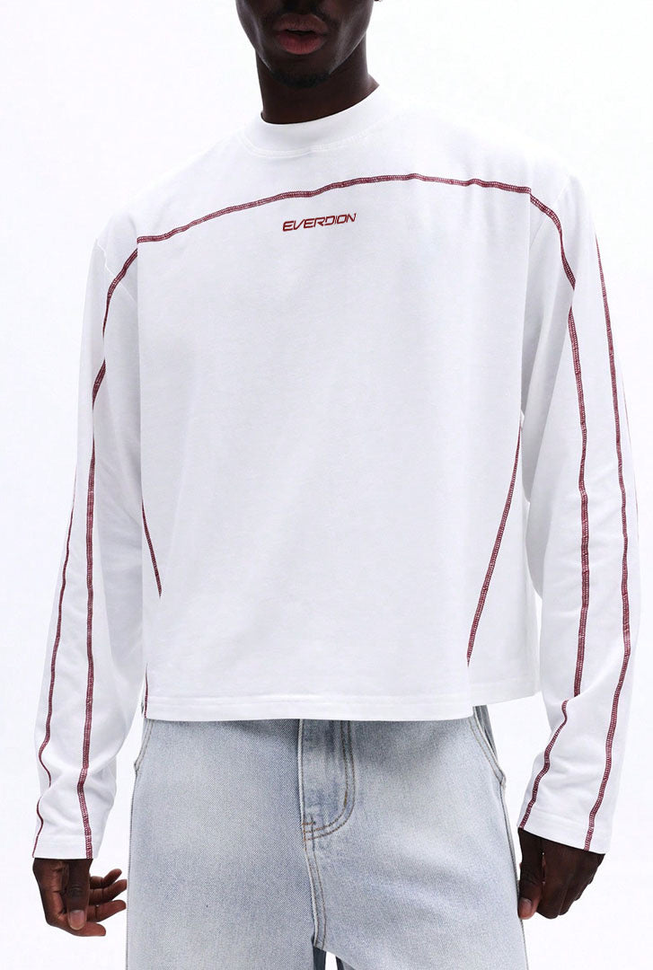 White long-sleeve shirt with red accents and 'EVERDION' logo worn by a person on a white background