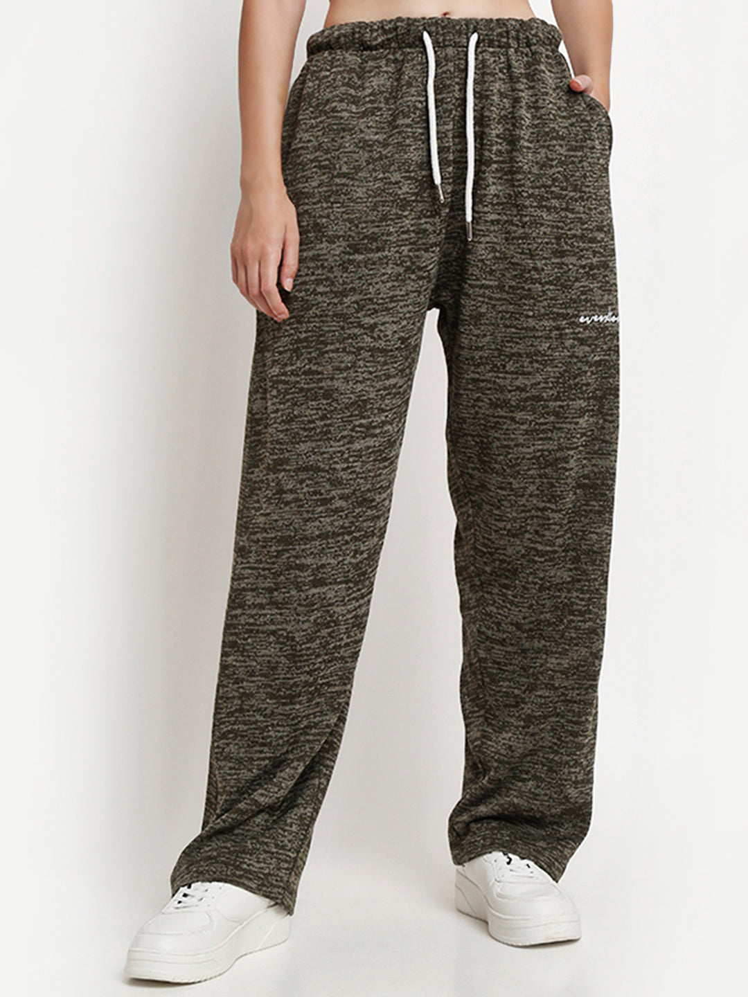 A pair of green acid wash loose fit jogger pants with a drawstring waistband, designed for women.