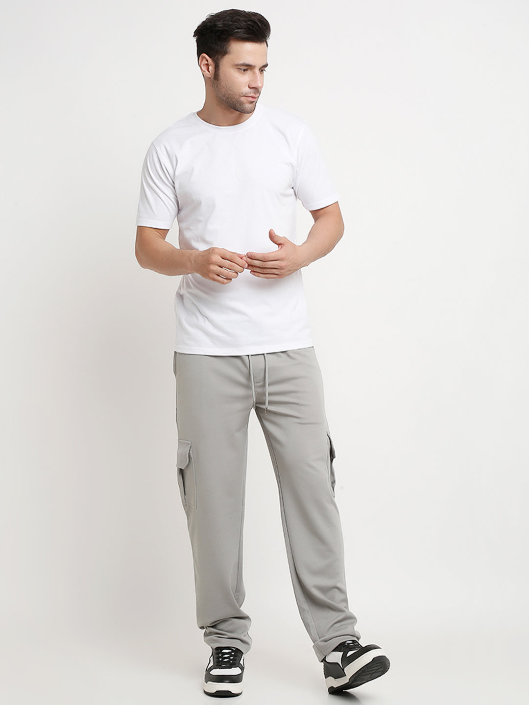 Grey slim fit cargo pants with large side flap pockets