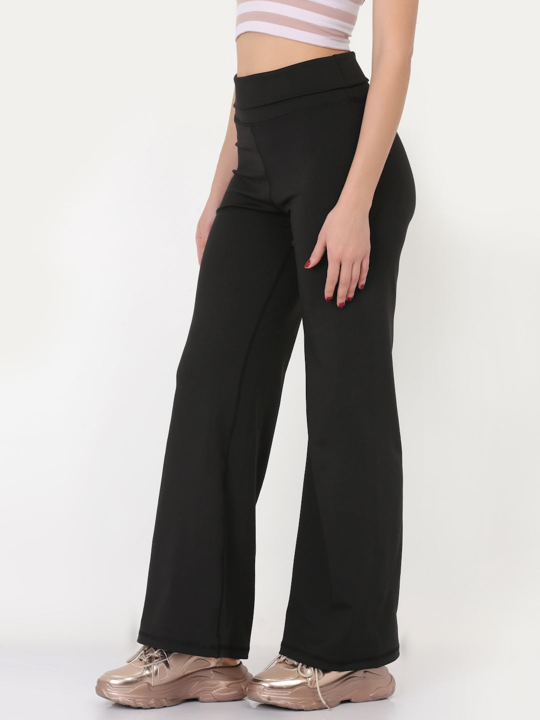 A pair of black ultra flare leggings featuring a foldover waistband, designed for comfort and style.