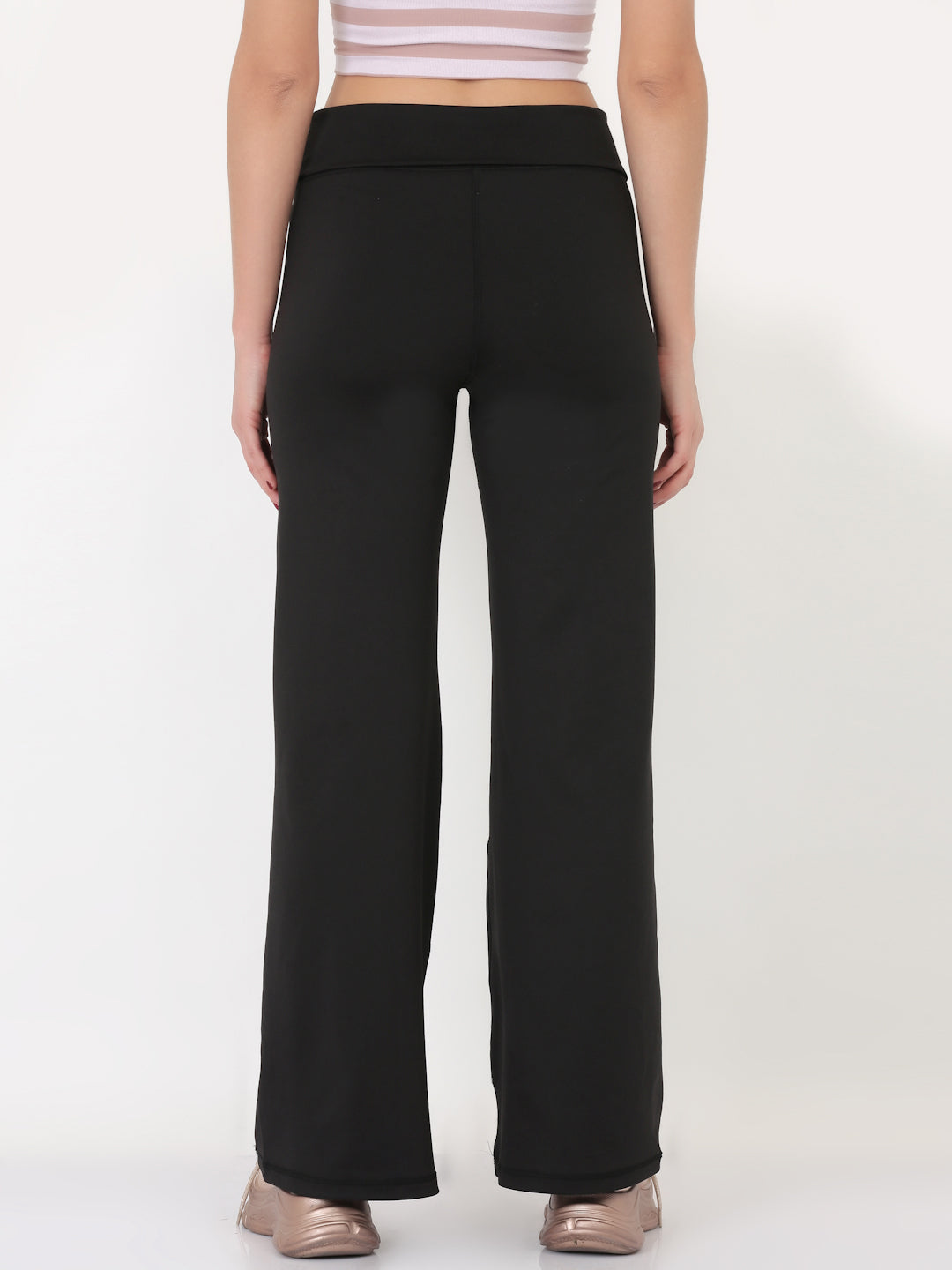 A pair of black ultra flare leggings featuring a foldover waistband, designed for comfort and style.