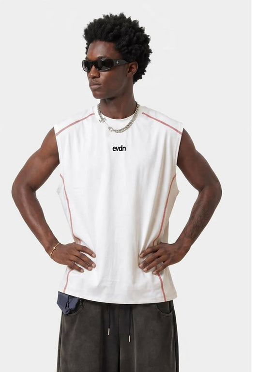 Man wearing a sleeveless white shirt with red accents and sunglasses on a white background