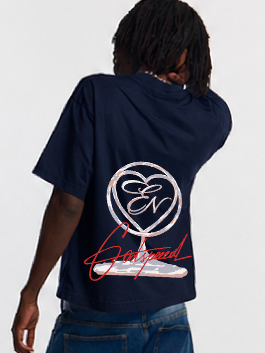 Person wearing a navy blue t-shirt with a logo and text on the back against a white background
