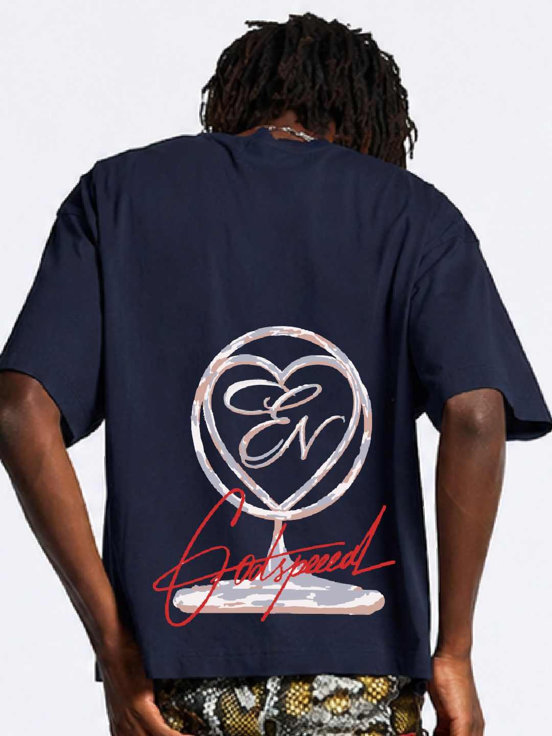 Person wearing a navy blue t-shirt with a logo and text on the back, standing against a plain background.