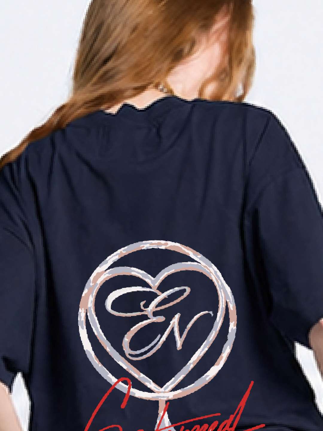 Navy blue shirt with a heart-shaped logo and text on the back