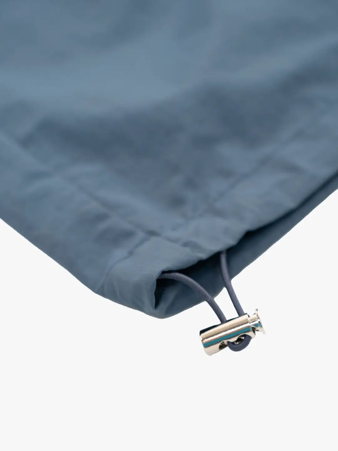 The Blue pant delivers a structured yet lightweight feel, while the relaxed-fit track pants ensure fluid movement and all-day comfort. 