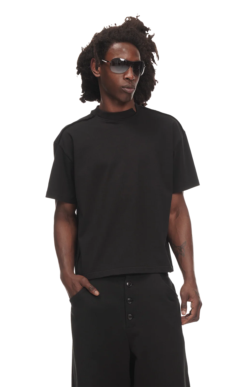 Person wearing a black t-shirt and sunglasses on a white background