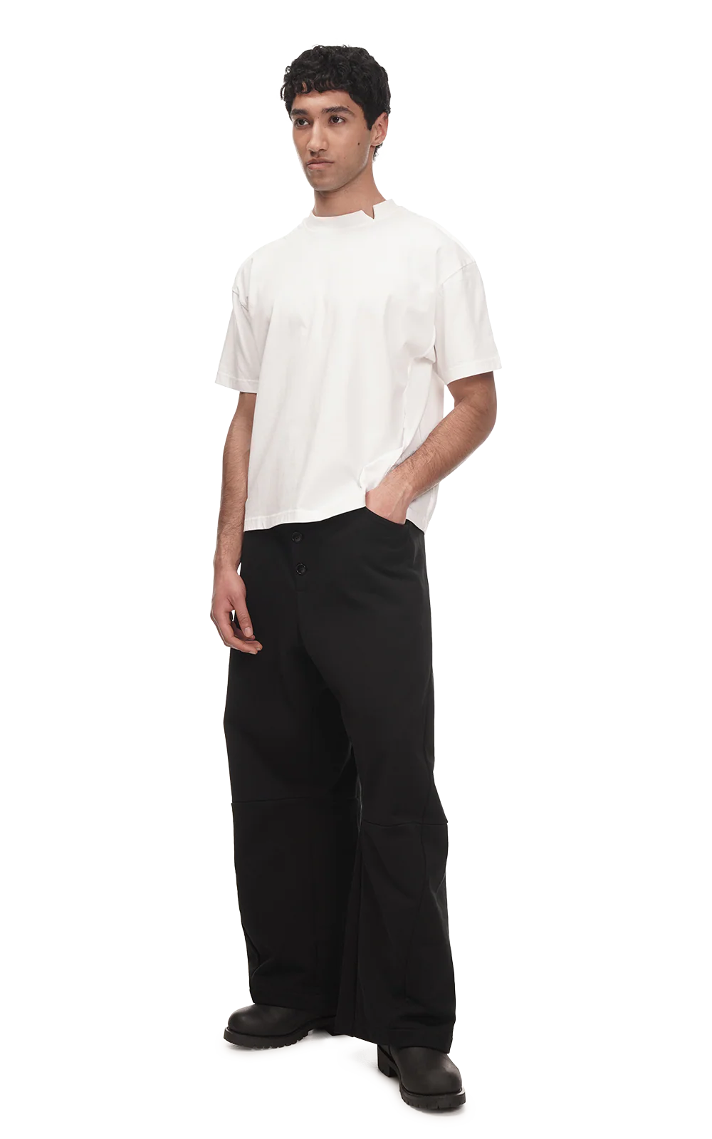 Man wearing a white t-shirt and black pants on a white background