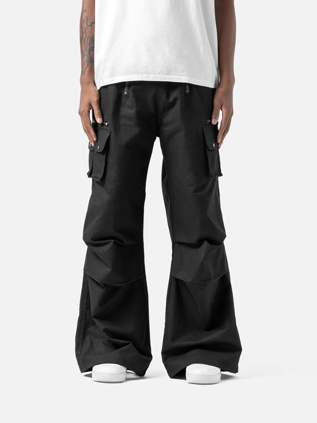 Black cargo pants with adjustable drawstrings and pockets on a white background