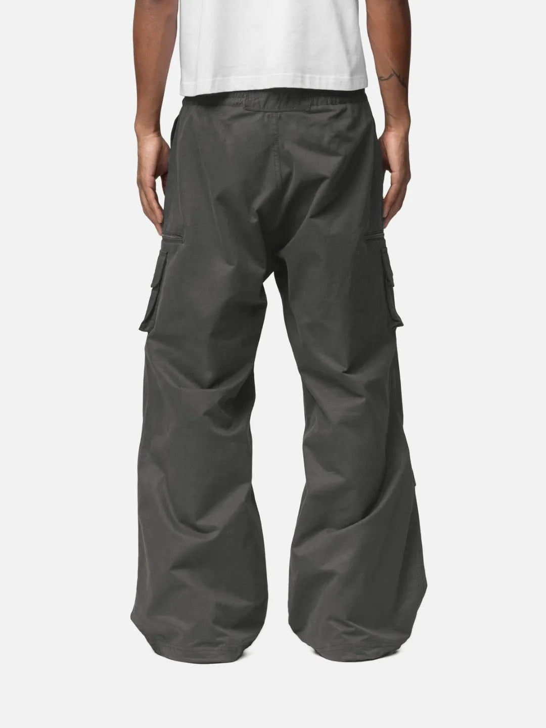 Grey cargo pants with adjustable drawstrings and pockets on a white background