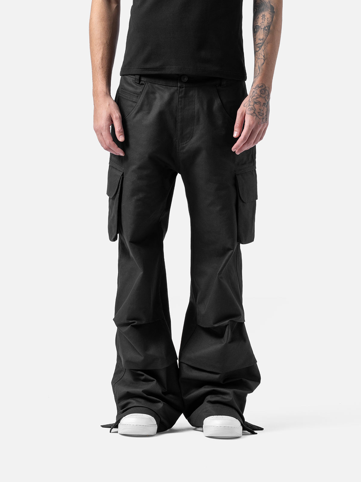 Black Celestial Cargo bold streetwear energy with everyday comfort. With oversized utility pockets, a relaxed silhouette and elevated detailing, these pants are built for movement and presence.