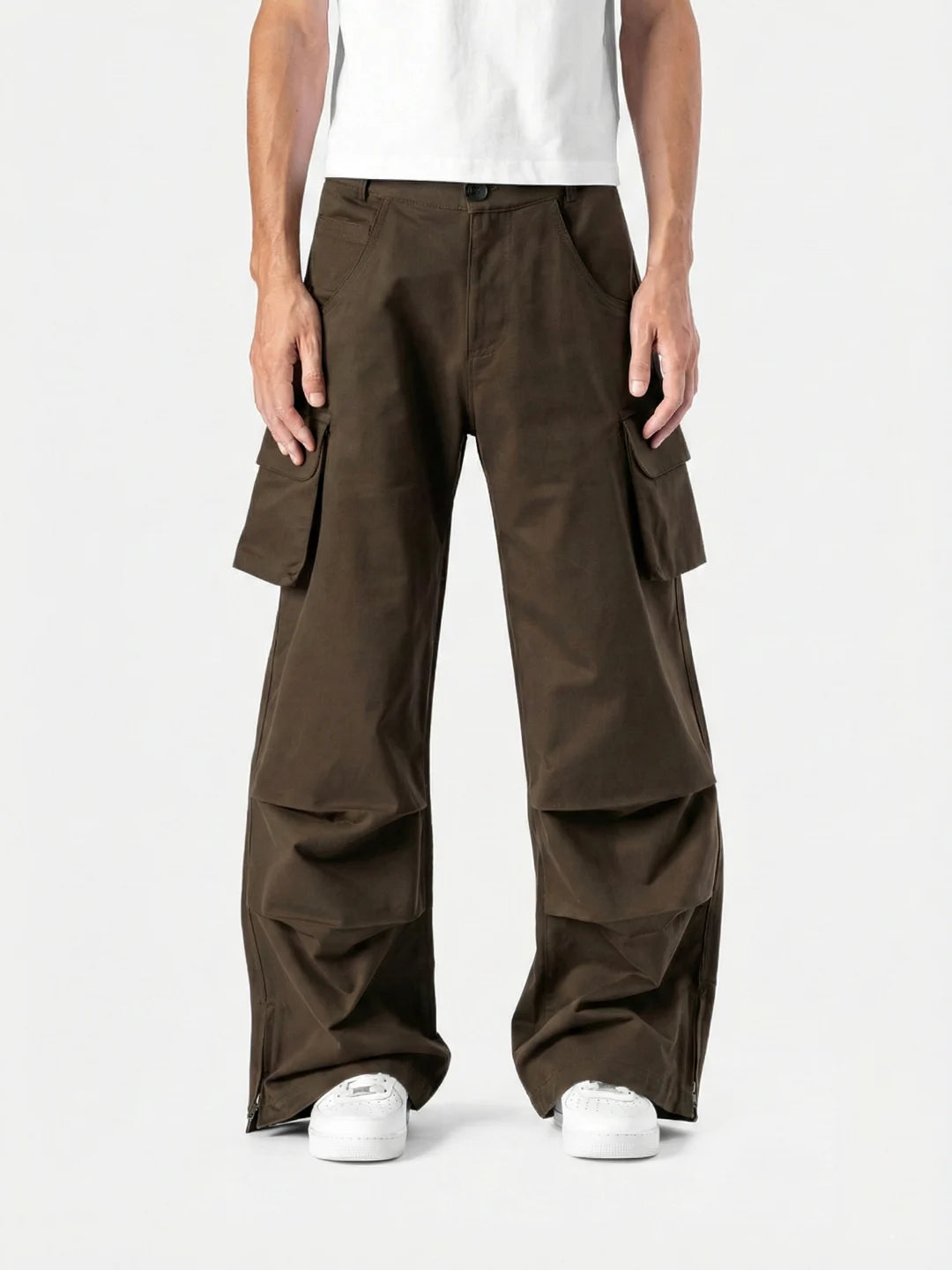 Brown Celestial Cargo bold streetwear energy with everyday comfort. With oversized utility pockets, a relaxed silhouette and elevated detailing, these pants are built for movement and presence.