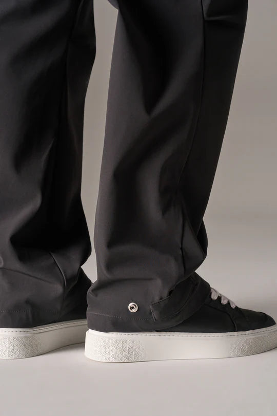 Kyoto Black Cargo Pant is a modern utility essential designed with a relaxed wide-leg silhouette for effortless everyday wear. Crafted with a technical, structured fabric, these cargo pants balance durability with comfort, making them ideal for contemporary streetwear and elevated casual styling.