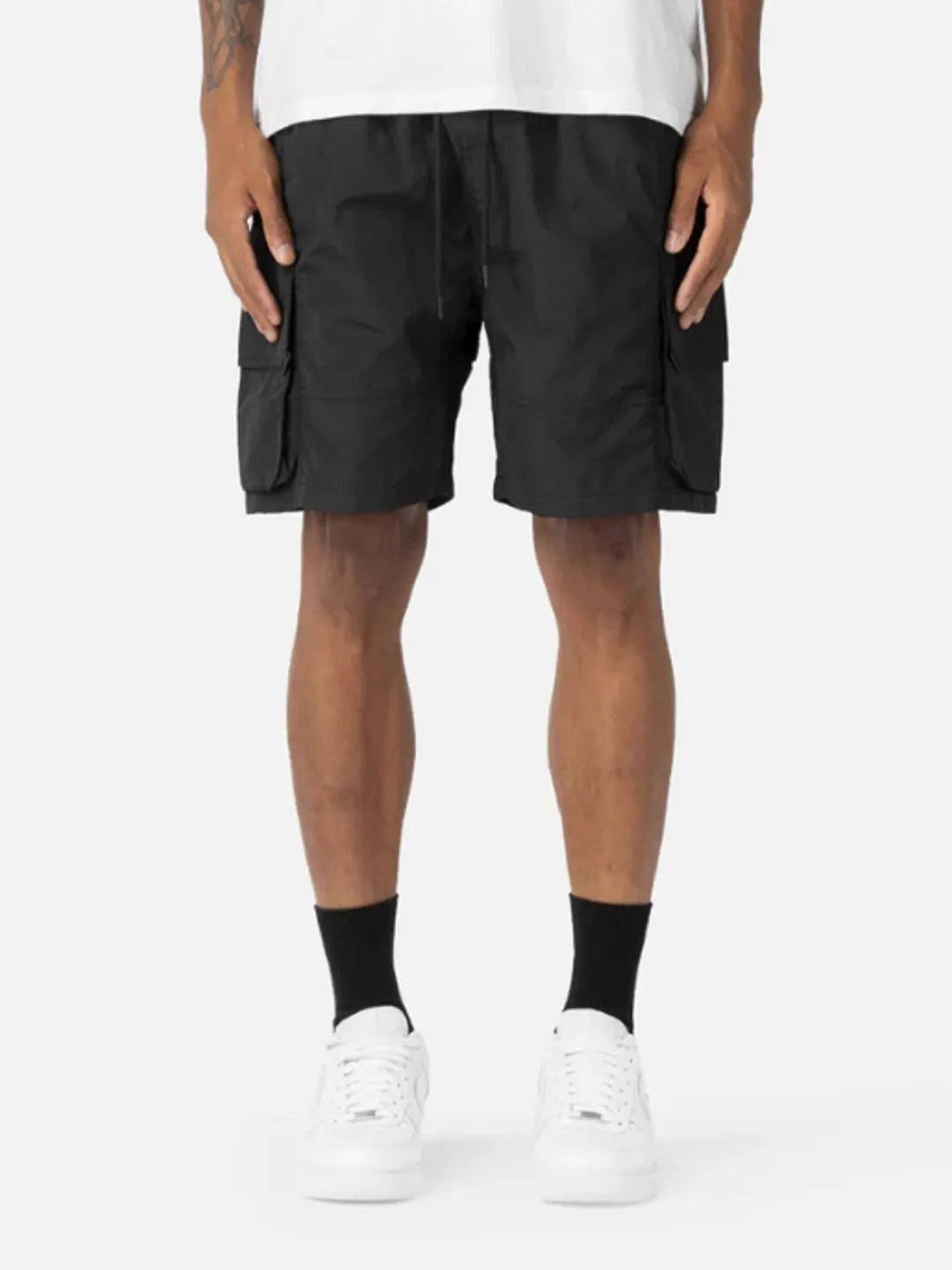 Person wearing black Gaze Shorts