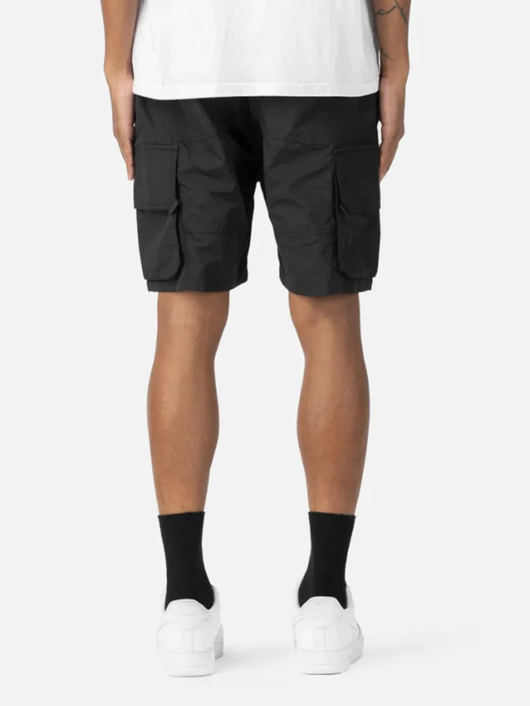 Person wearing black Gaze Shorts
