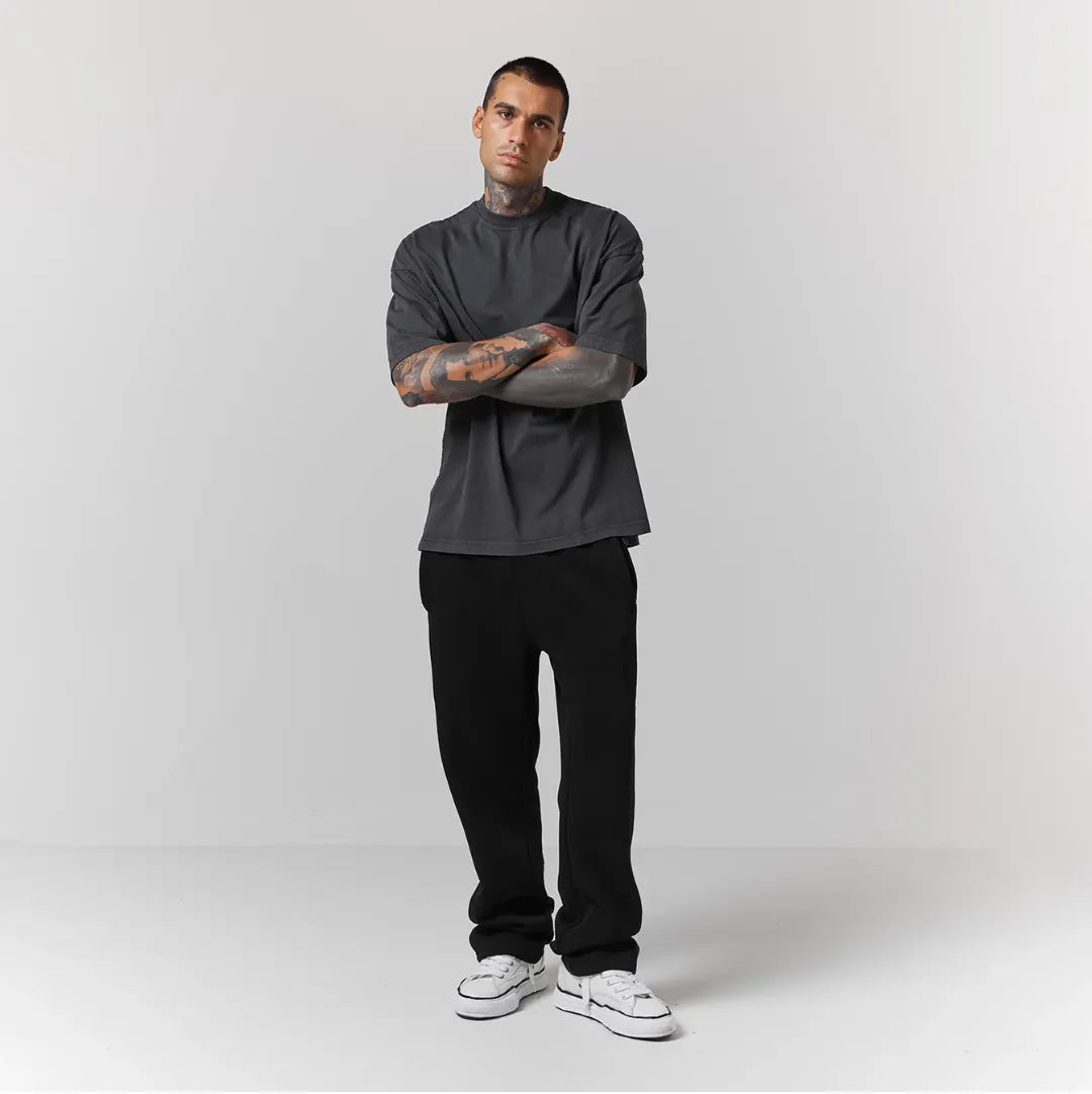 Person wearing black jogger 