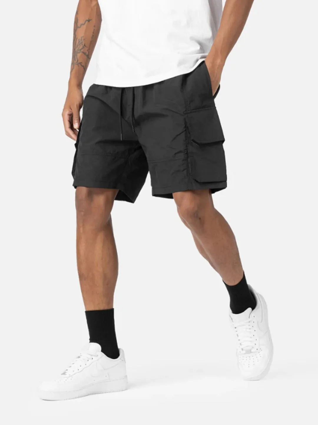 Person wearing black Gaze Shorts