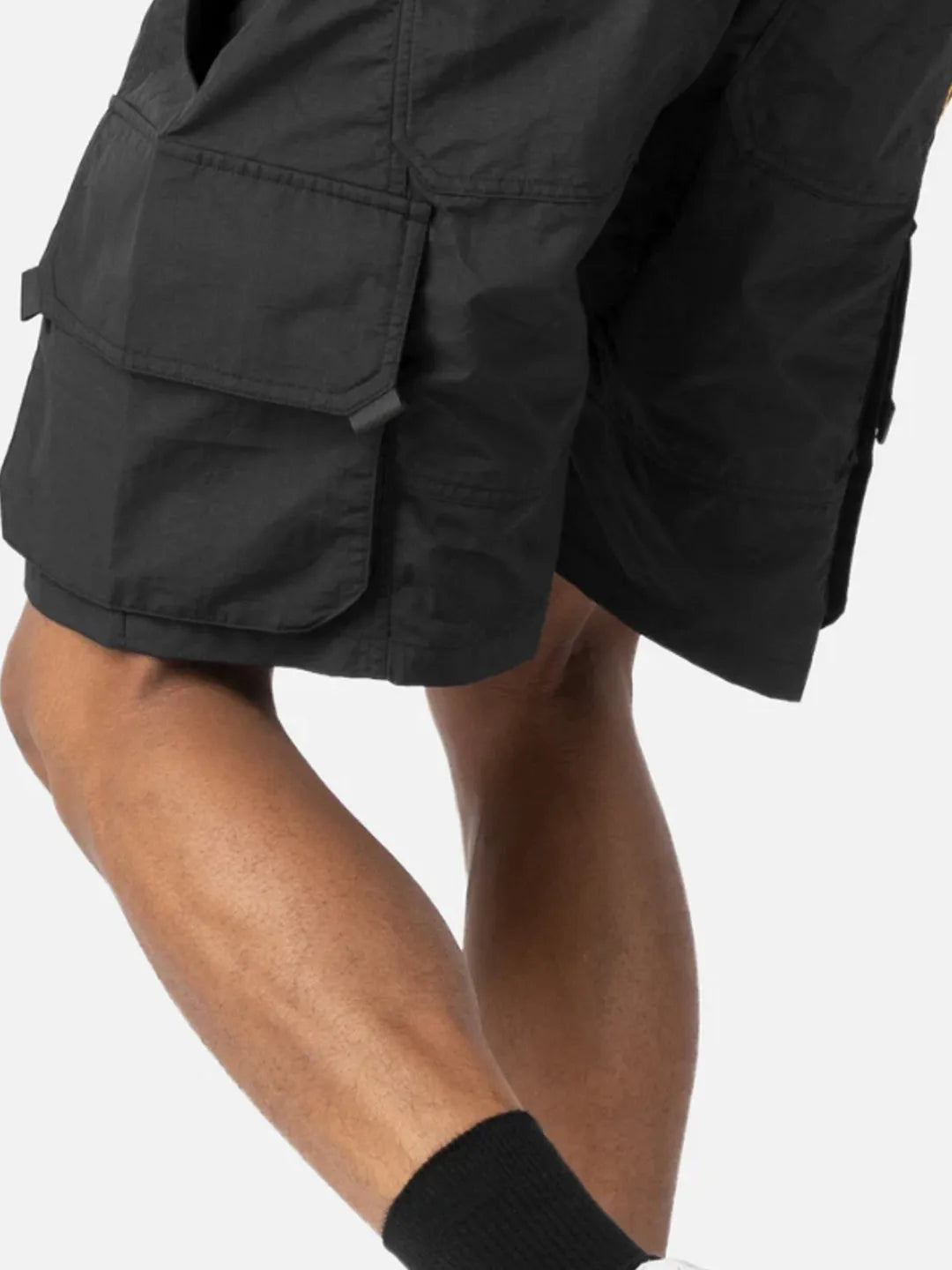 Person wearing black Gaze Shorts