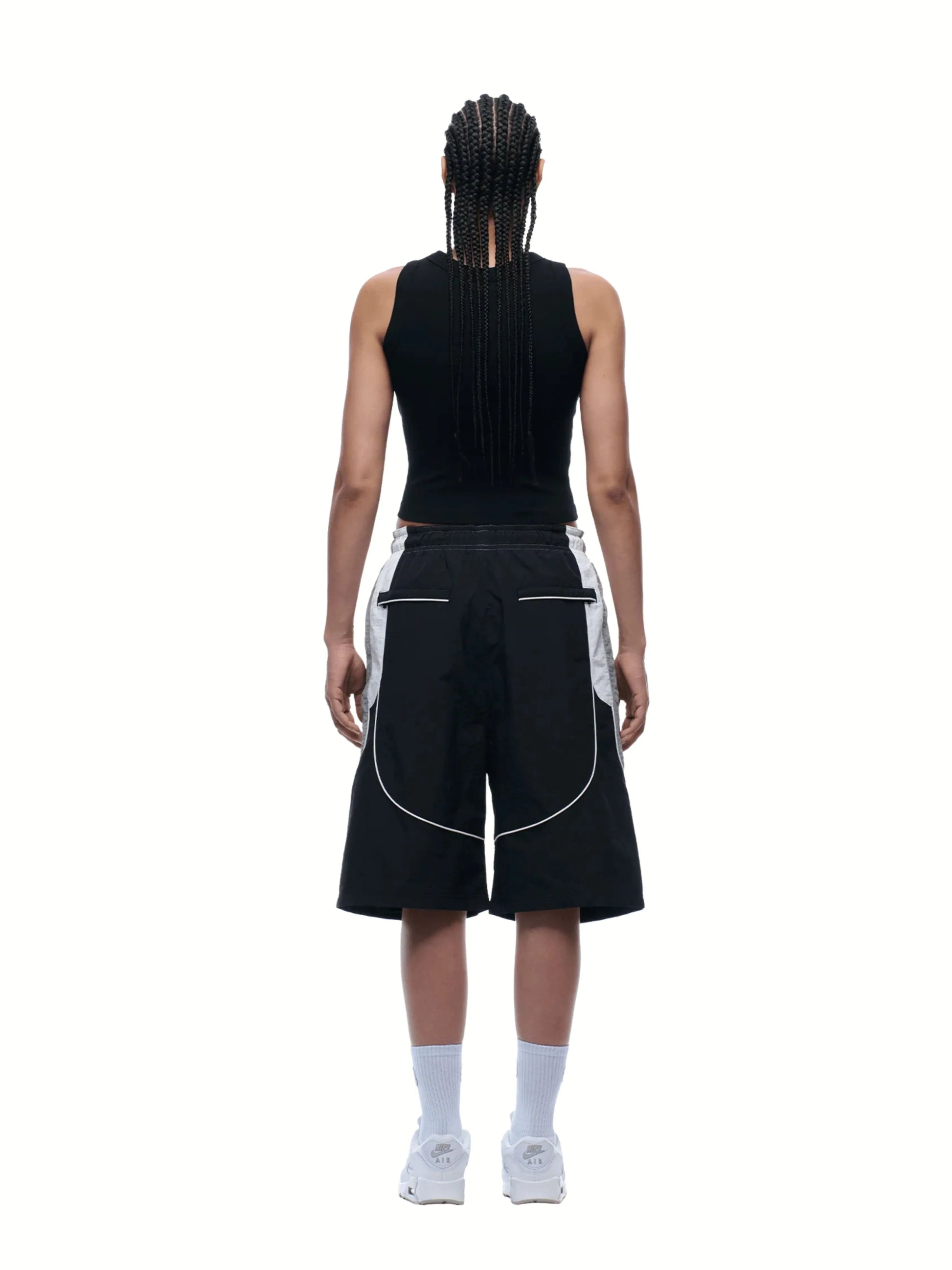 Person wearing Baggy Track Shorts