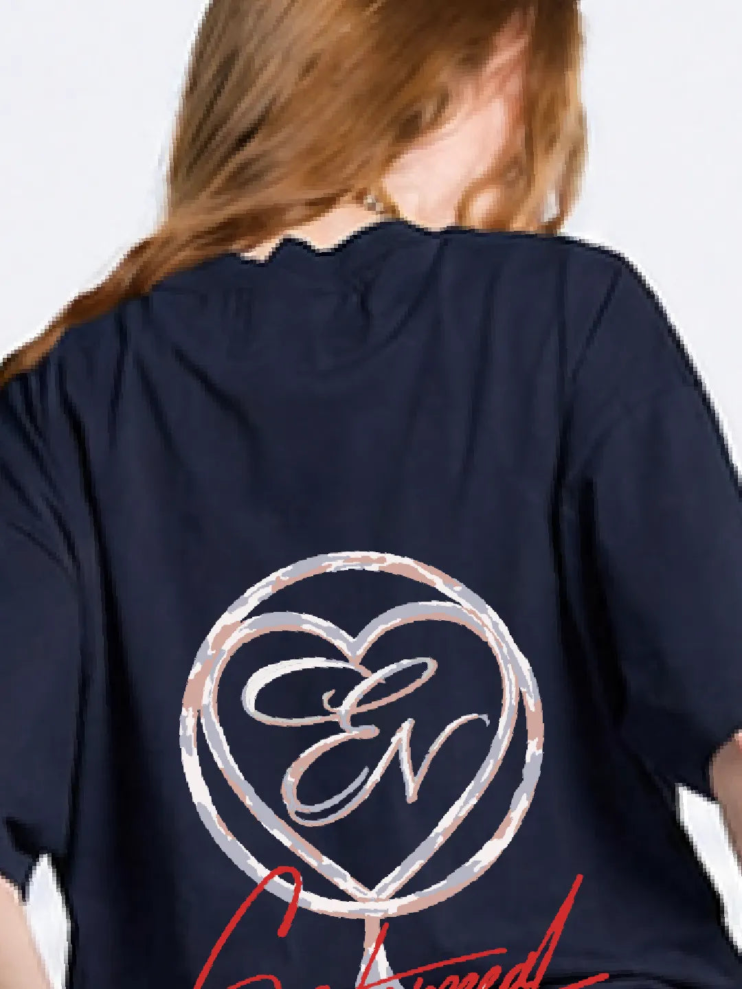 Navy blue oversized t-shirt with a heart-shaped logo and text on the back