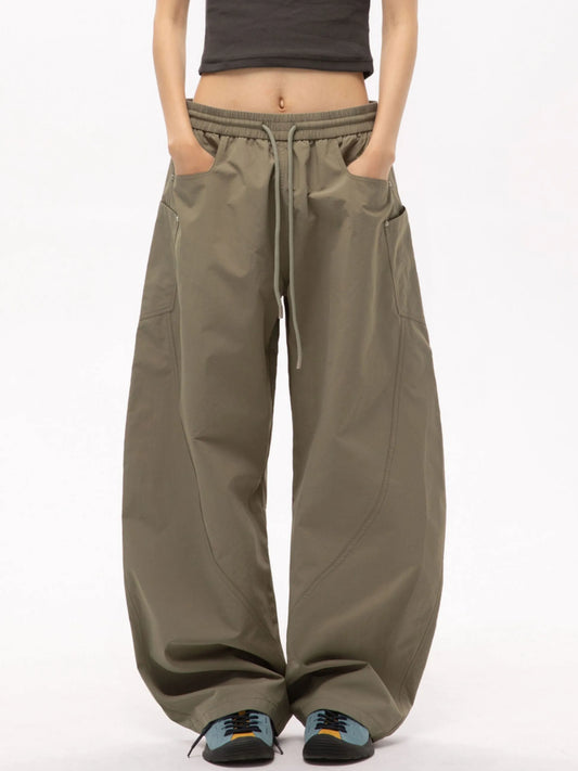 Person wearing mouse cargo pants on a white background