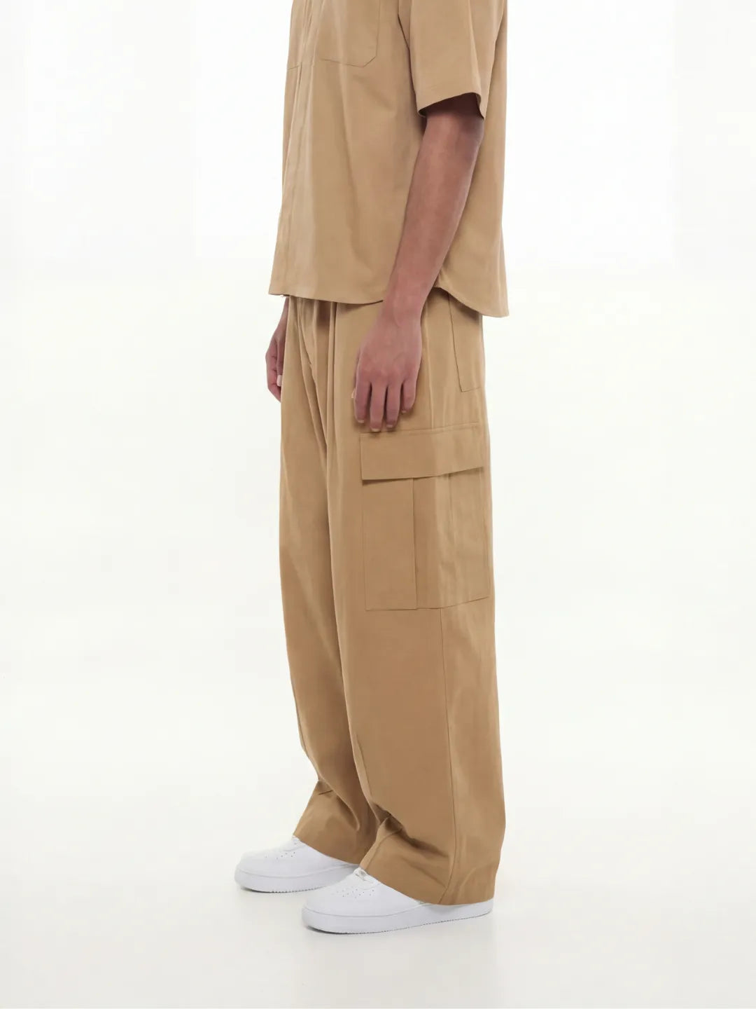 Person wearing a beige cargo pants