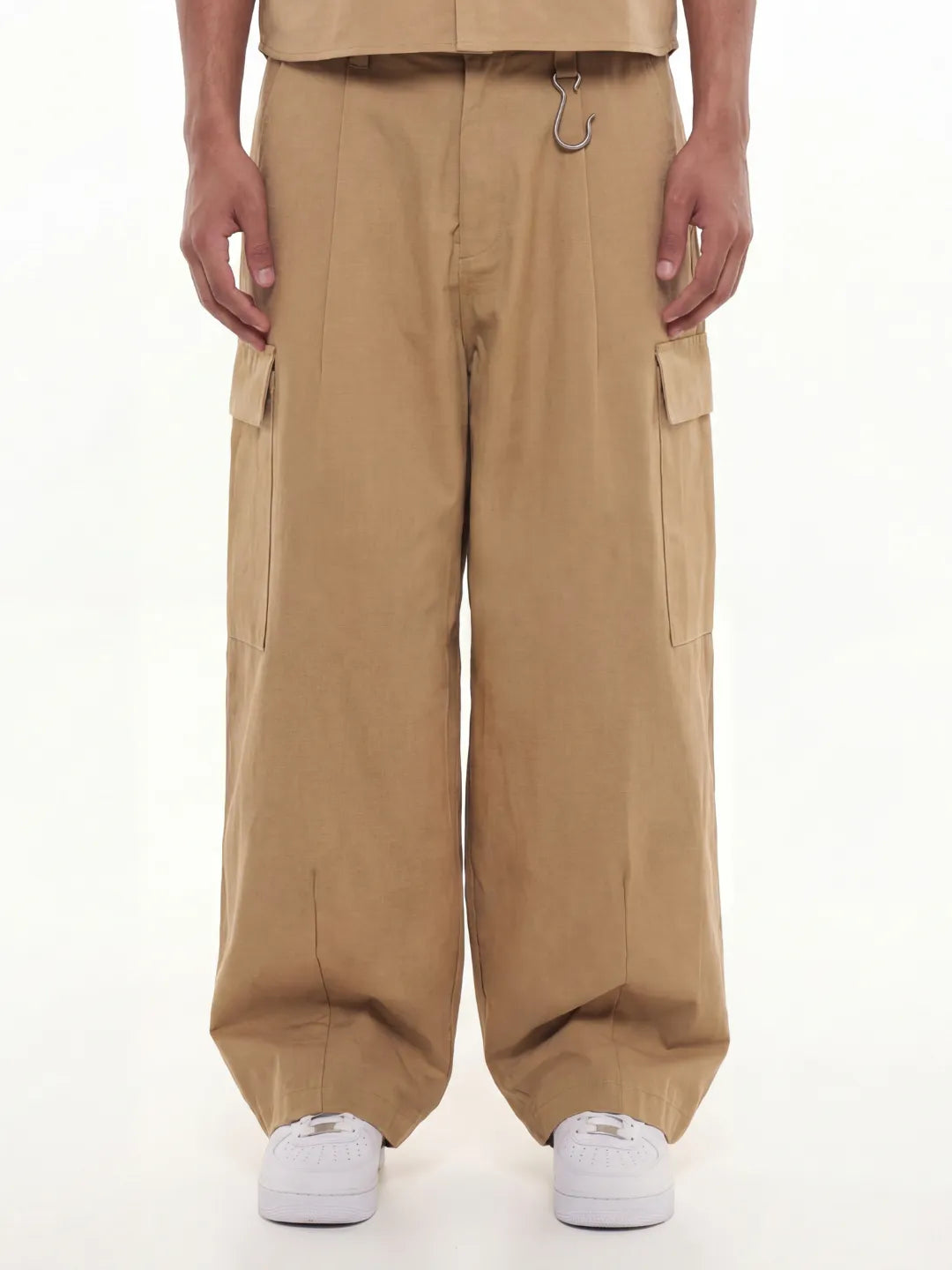 Person wearing a beige cargo pants