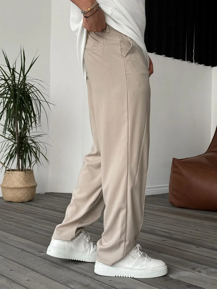 Person wearing beige office straight fit pants 