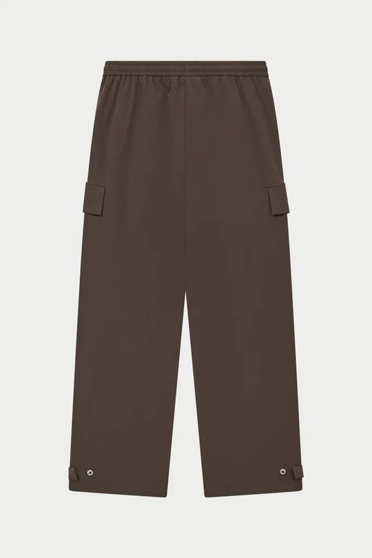 Kyoto Brown Cargo Pant is a modern utility essential designed with a relaxed wide-leg silhouette for effortless everyday wear. Crafted with a technical, structured fabric, these cargo pants balance durability with comfort, making them ideal for contemporary streetwear and elevated casual styling.